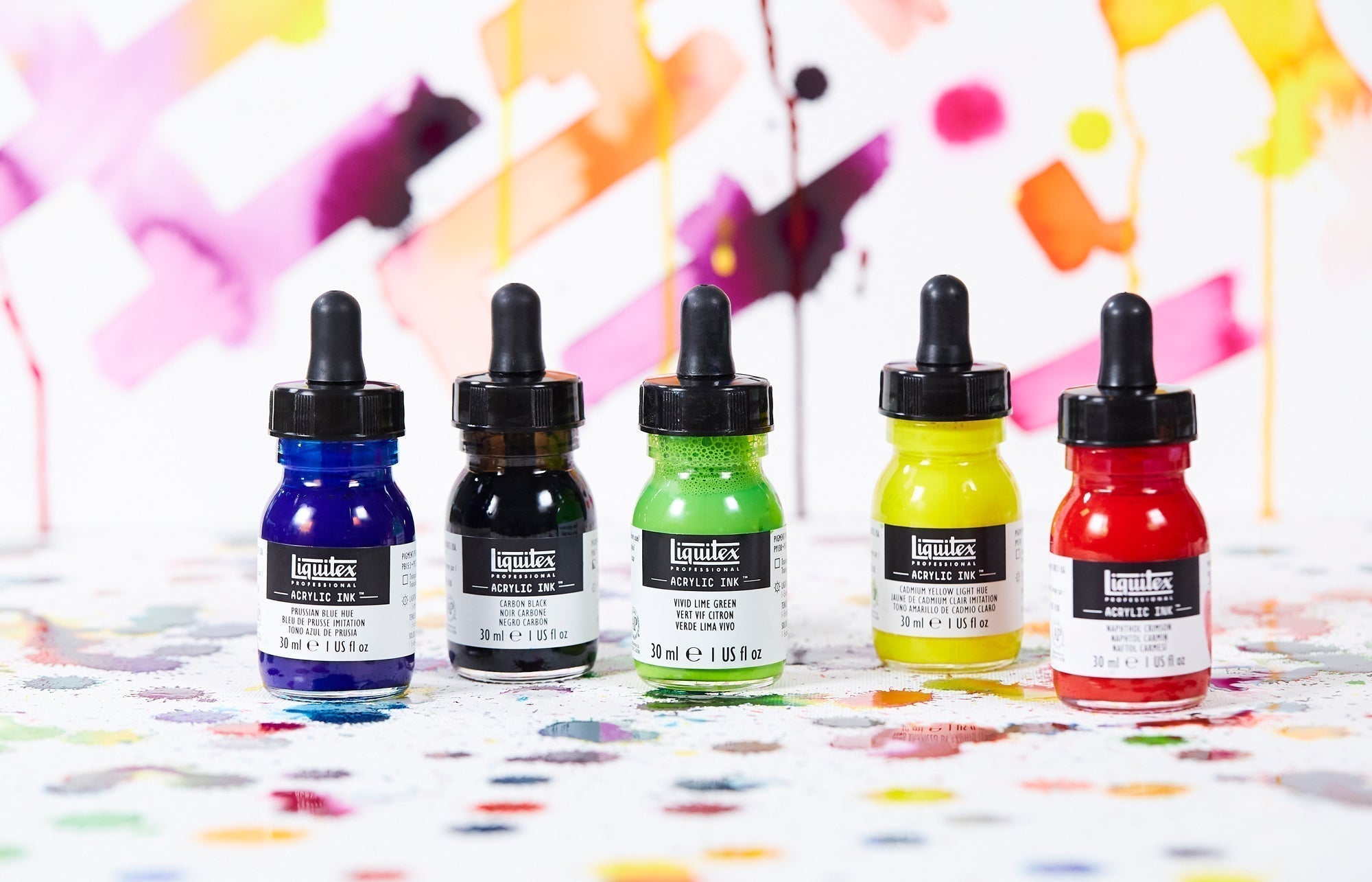 Image of 5 bottles of Acrylic Liquitex inks, in Blue, Black, Green, Yellow and Red.