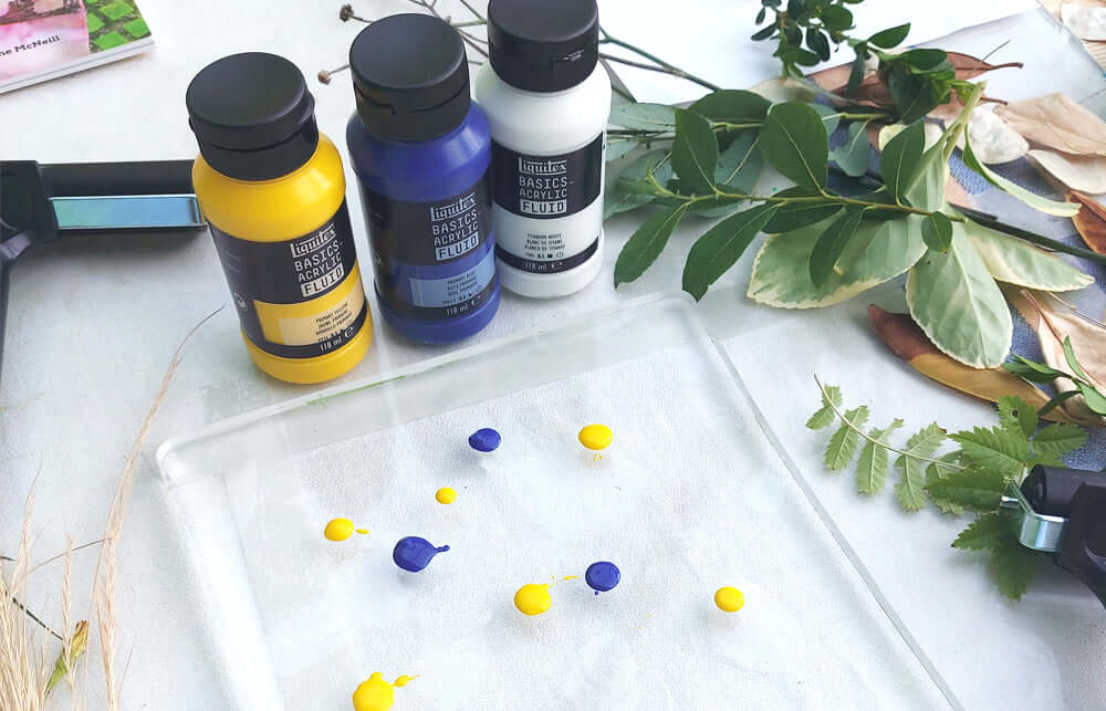 Liquitex acrylic fluid paint tubs and a geli plate with organic inspiration