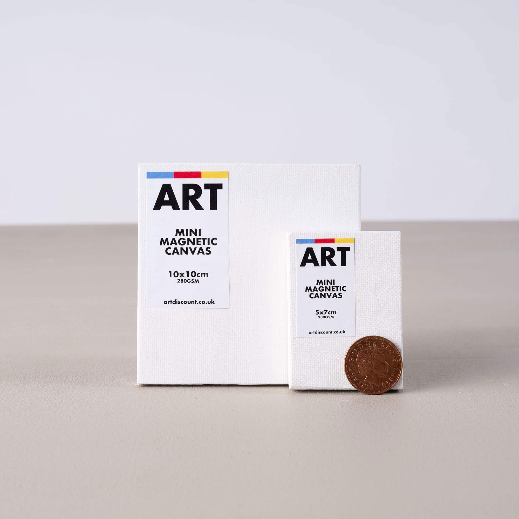 ARTdiscount Mini Magnetic Canvases, with a penny for scale