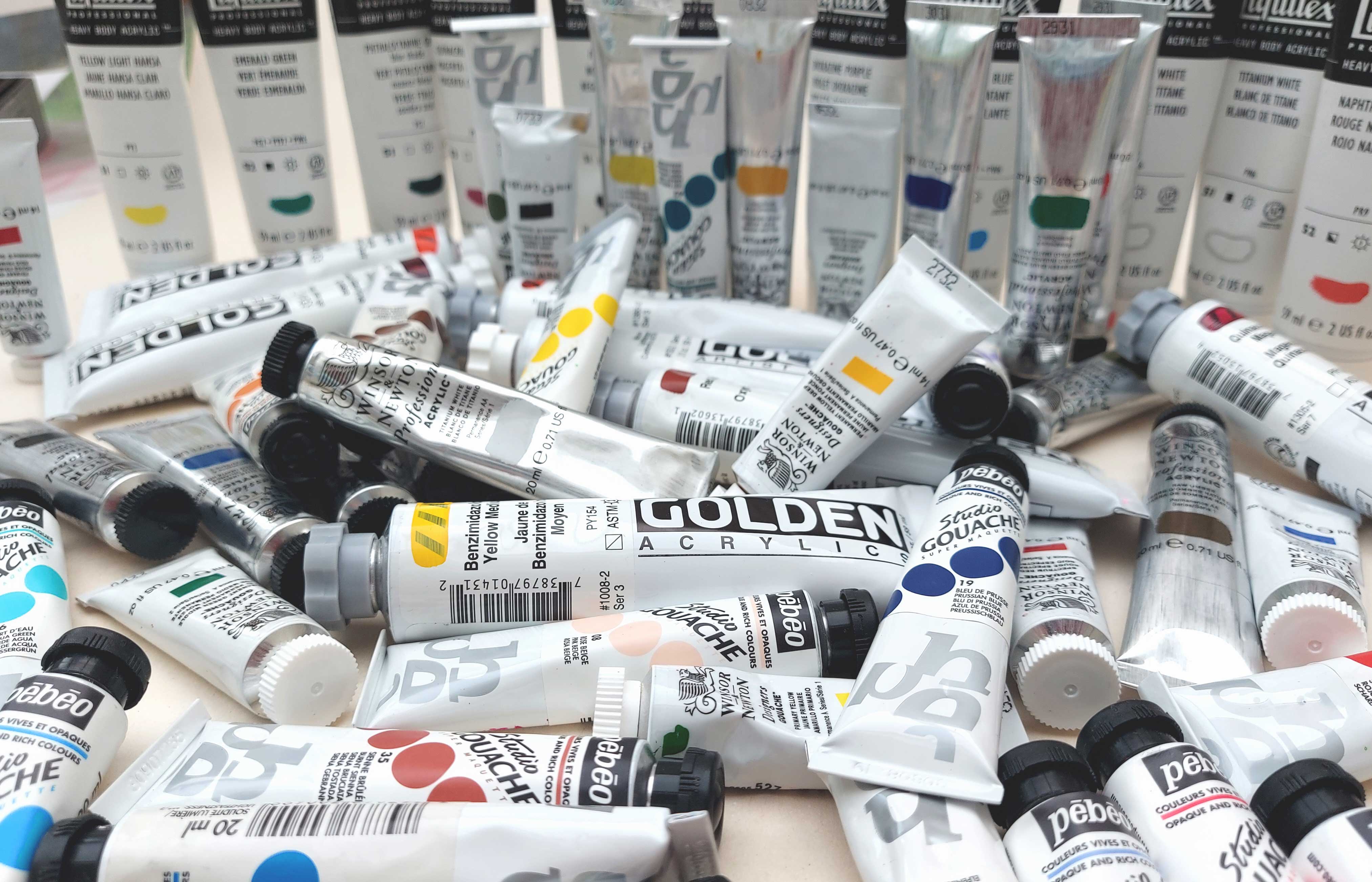 Collection of acrylic paint tubes.