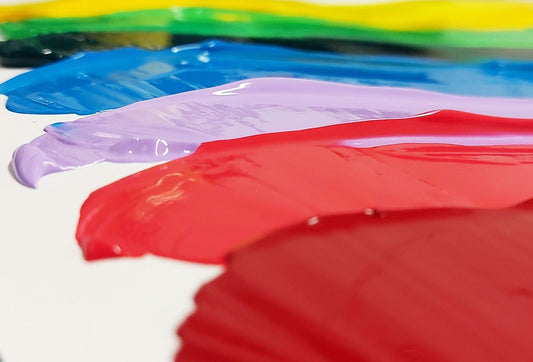 A Beginner’s Guide to Using Acrylic Paints showcasing vibrant colors of acrylic paint on a palette.