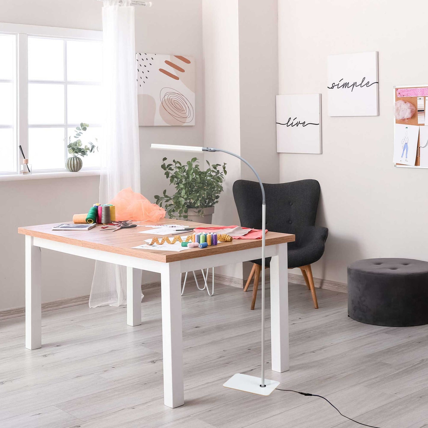 Daylight Company Uno Pro Floor Lamp in a workspace