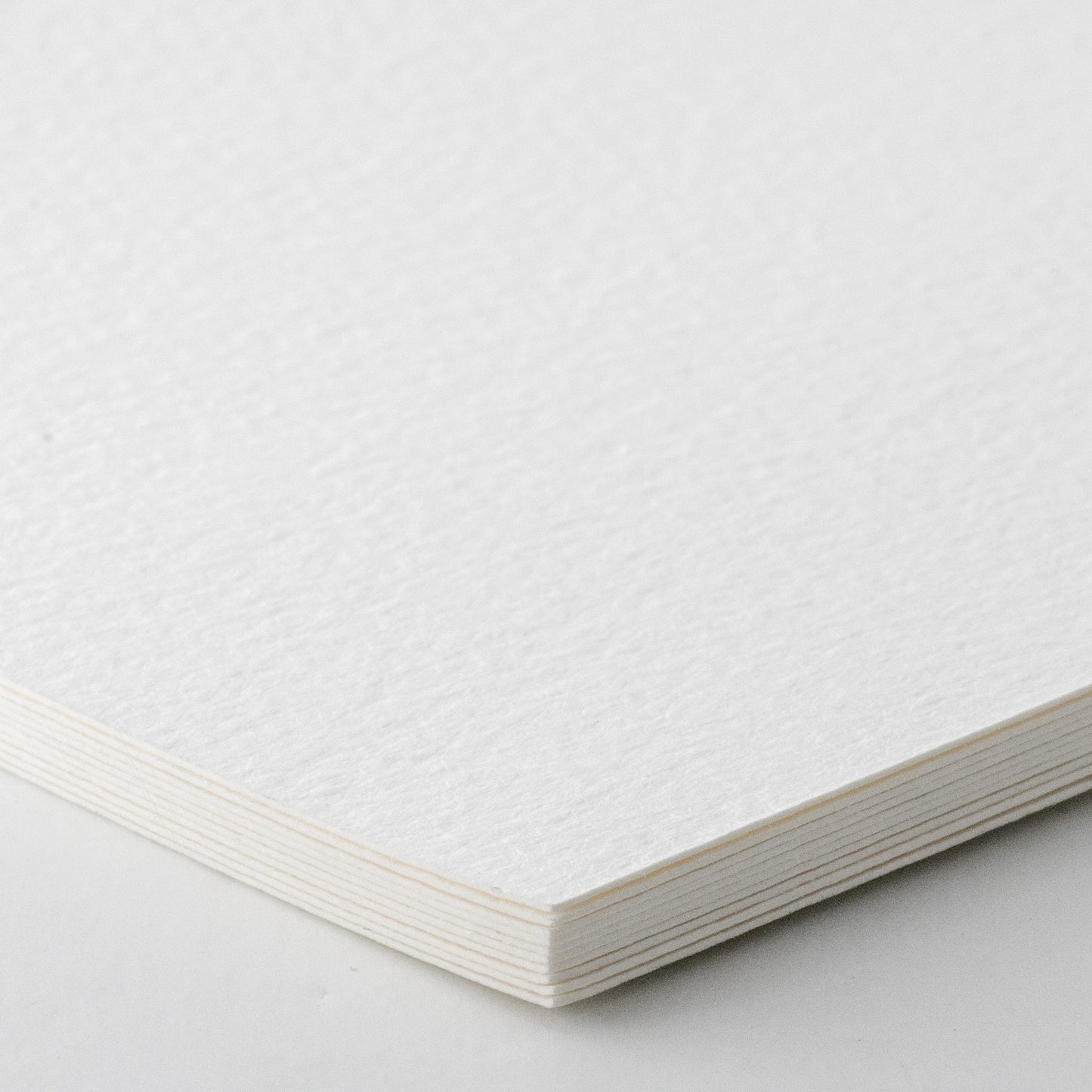 Closeup of the postcards included in the wooden box set