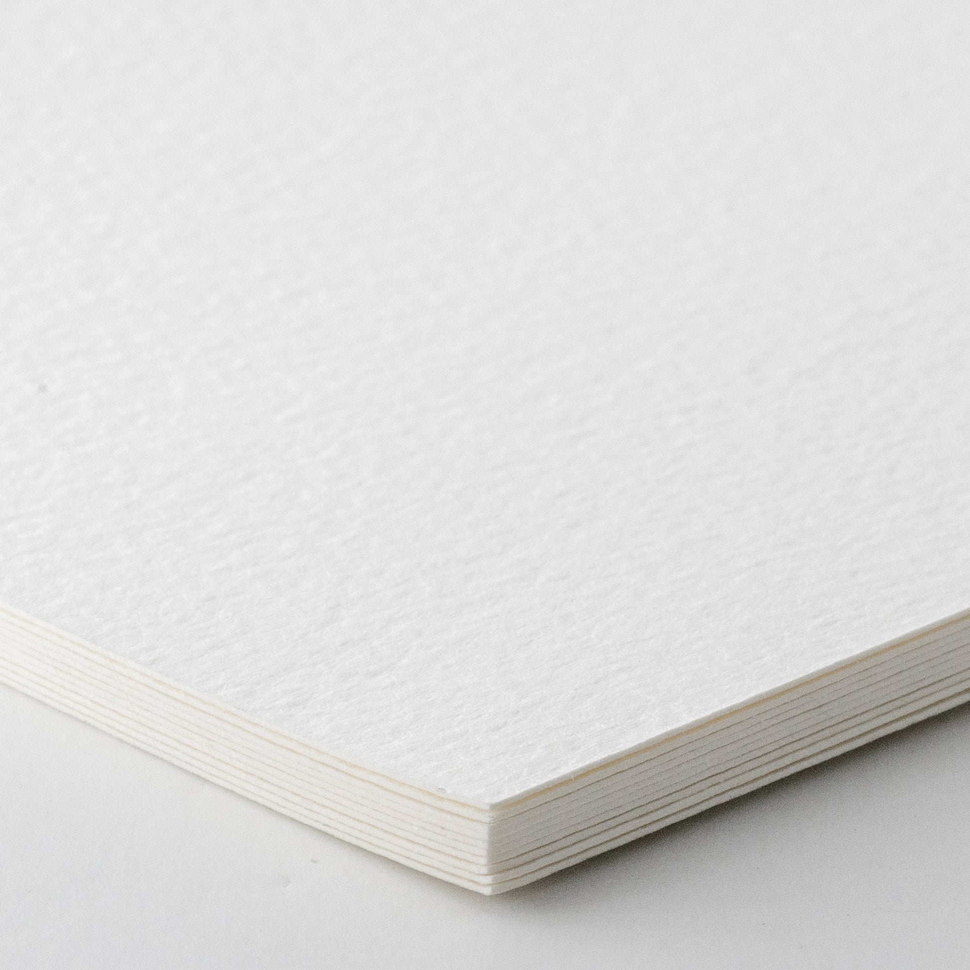 Closeup of the postcards included in the wooden box set