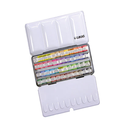 Set of watercolor paints in a Lukas case on a white background