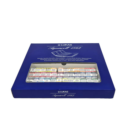 Blue box of Lukas watercolor paints with visible paint swatches on a white background