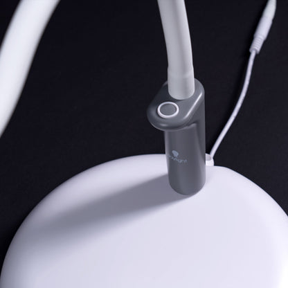 Close-up of the Daylight Company Magnificent Pro – 3-in-1 Magnifying Lamp base and flexible neck.