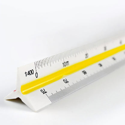 Close-up shot of the ruler showing some of the metric scale markings on 2 of the 6 sides.