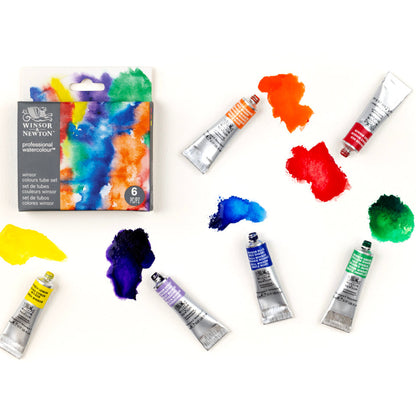 Set of Winsor & Newton watercolor paint tubes with a box on a white background