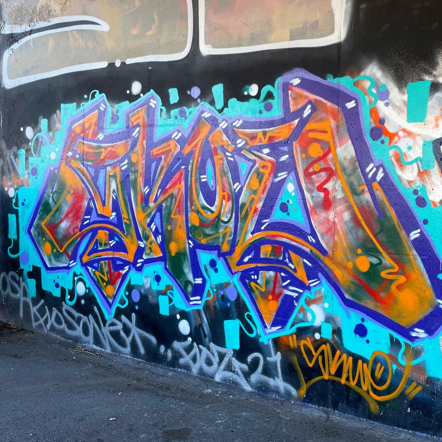 A large, graffiti mural created with Montana Gold