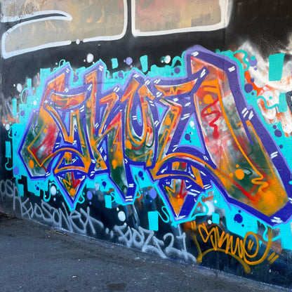 A large, graffiti mural created with Montana Gold