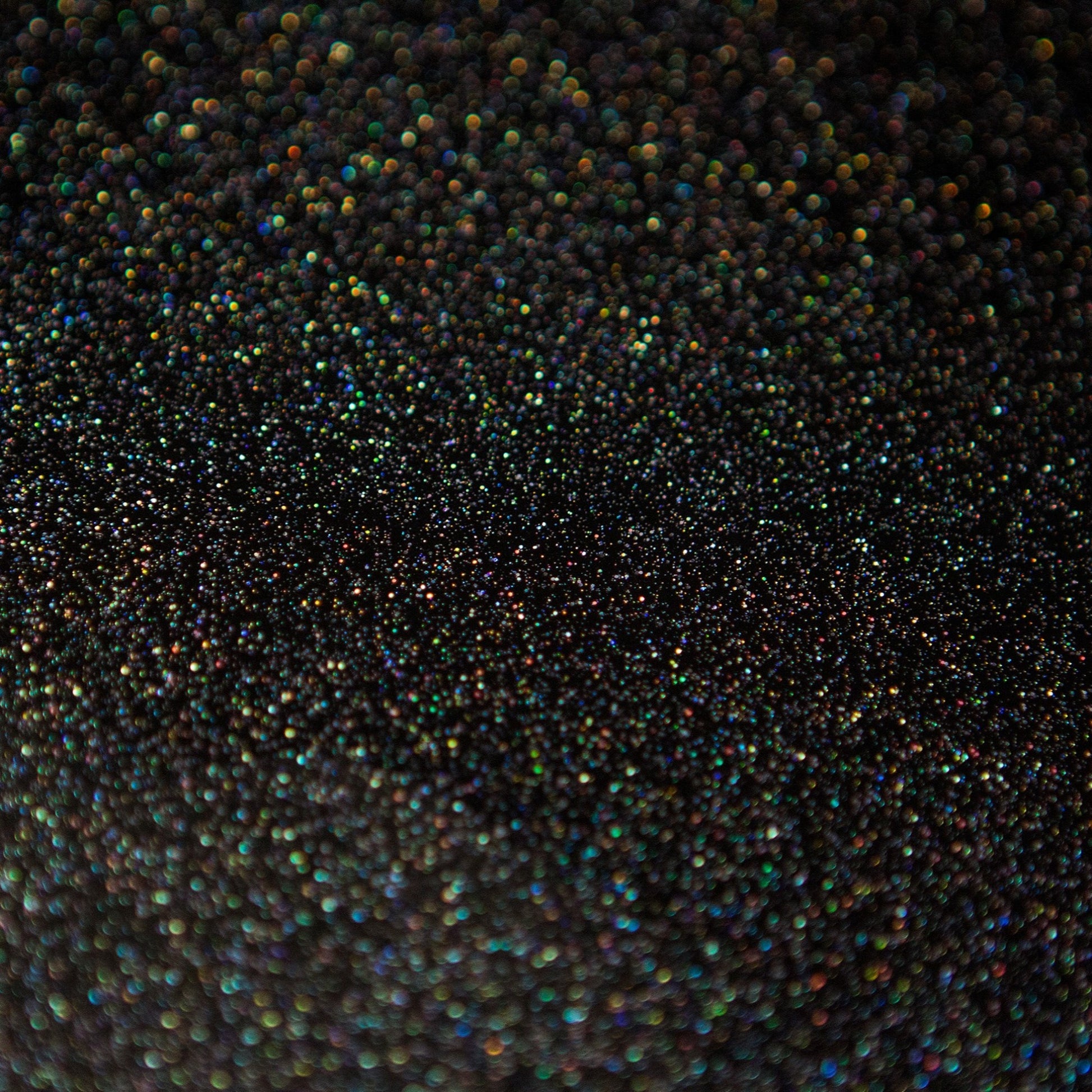 Montana Hologram Glitter Closeup On a Black Background